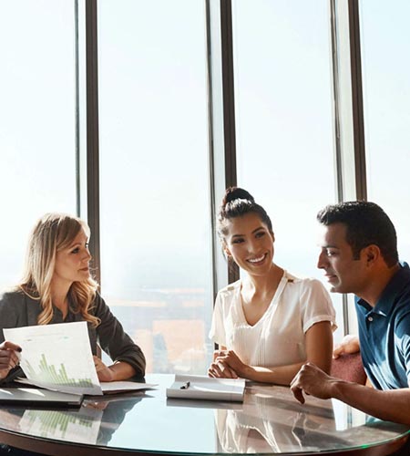 Financial advisors at conference table